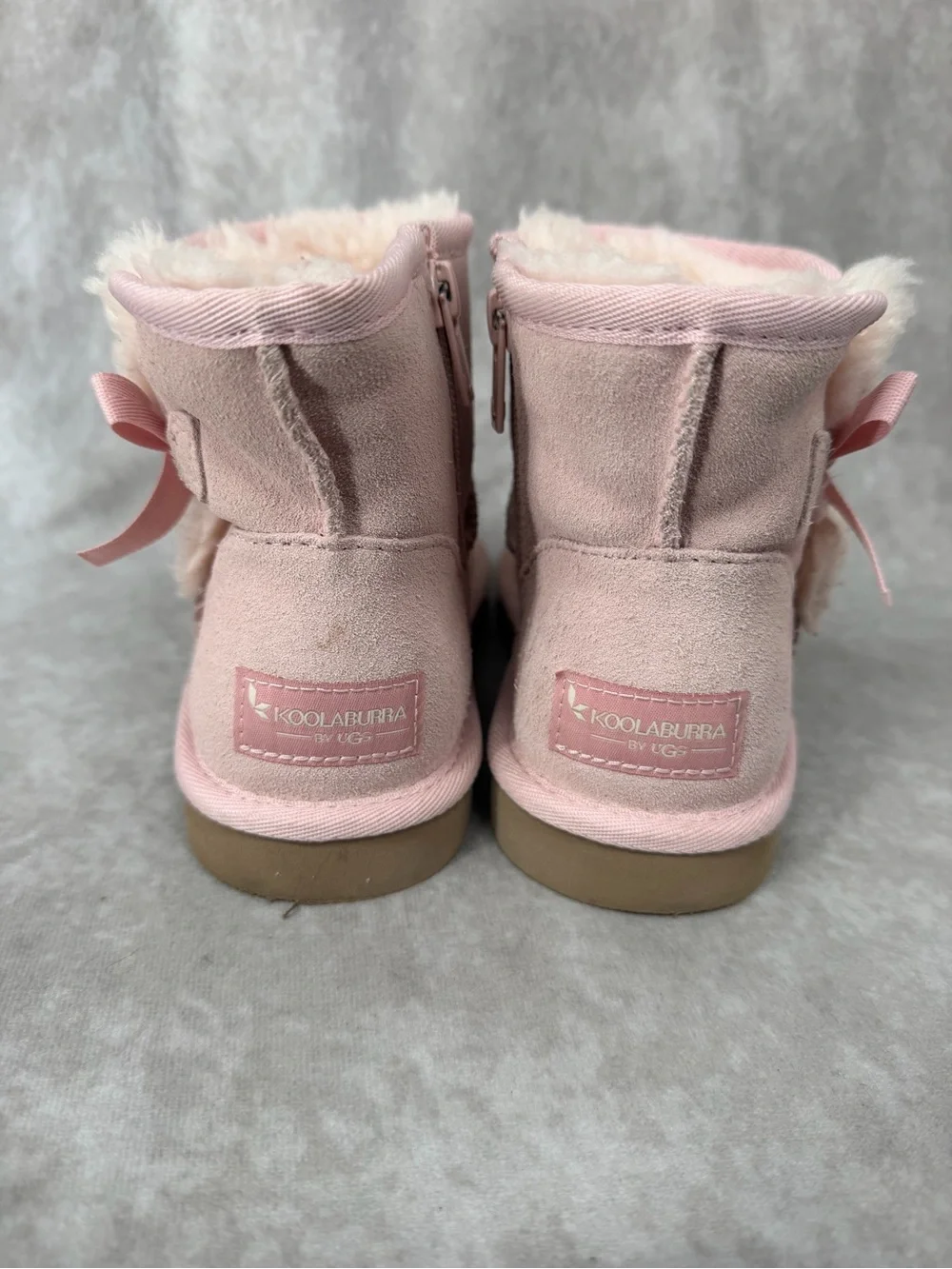 Koolaburra Pink Faux-Shearling Ankle Boots with Pom Detail